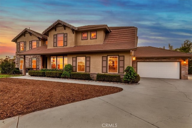 view of front of home with a garage