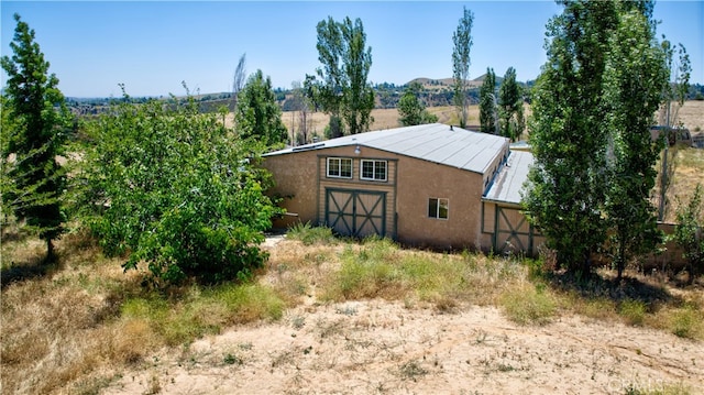 exterior space featuring a rural view