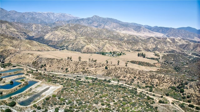 view of mountain feature featuring a water view