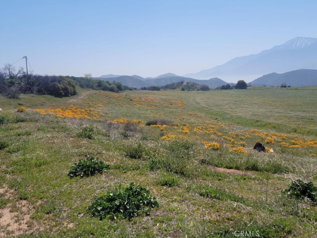 view of mountain feature featuring a rural view