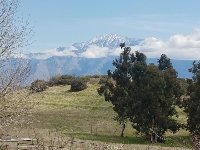 view of mountain feature with a rural view