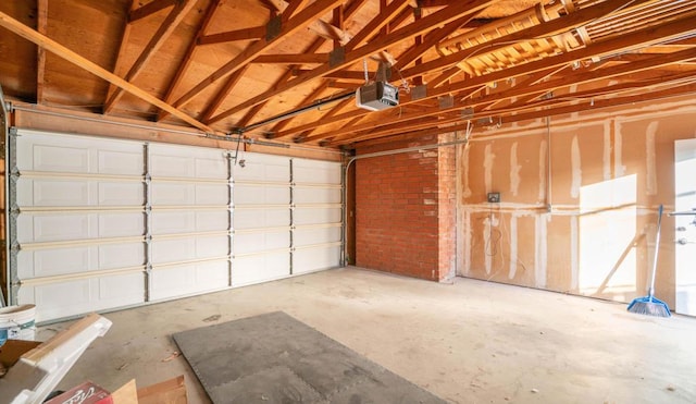 garage featuring a garage door opener