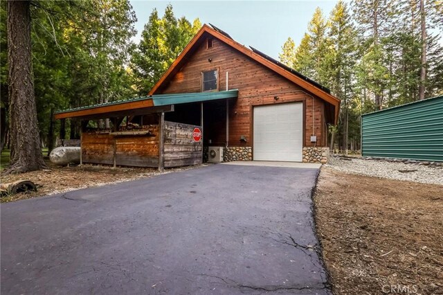 garage with a carport