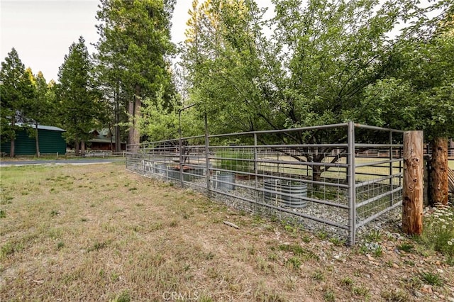 view of yard with an exterior structure and an outbuilding