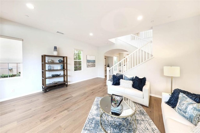 living room with light hardwood / wood-style flooring