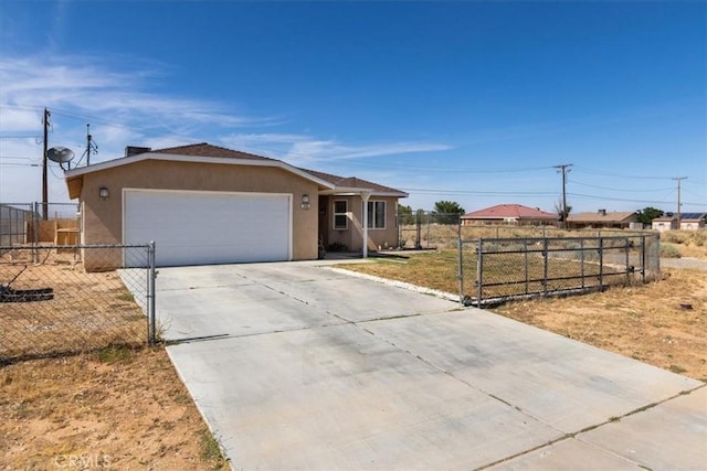 ranch-style home with a front yard and a garage