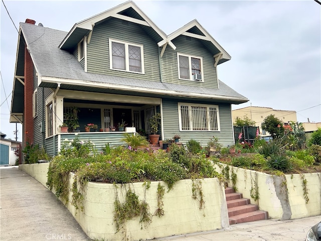 craftsman-style house featuring a trampoline