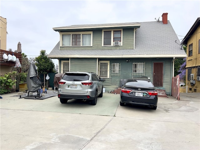 view of front of home with cooling unit