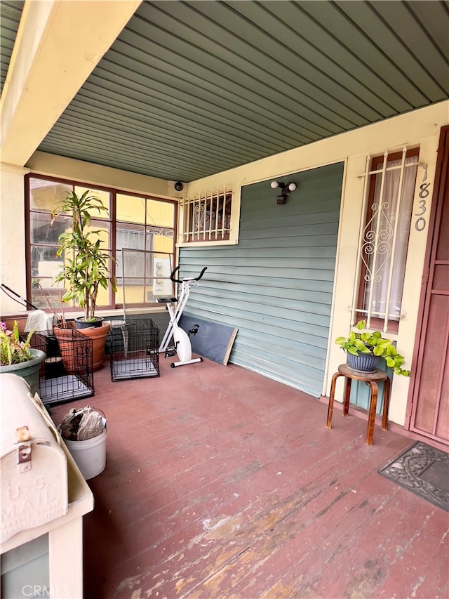 wooden deck with covered porch