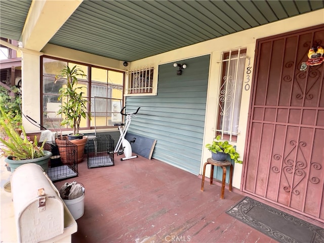 view of patio featuring a porch