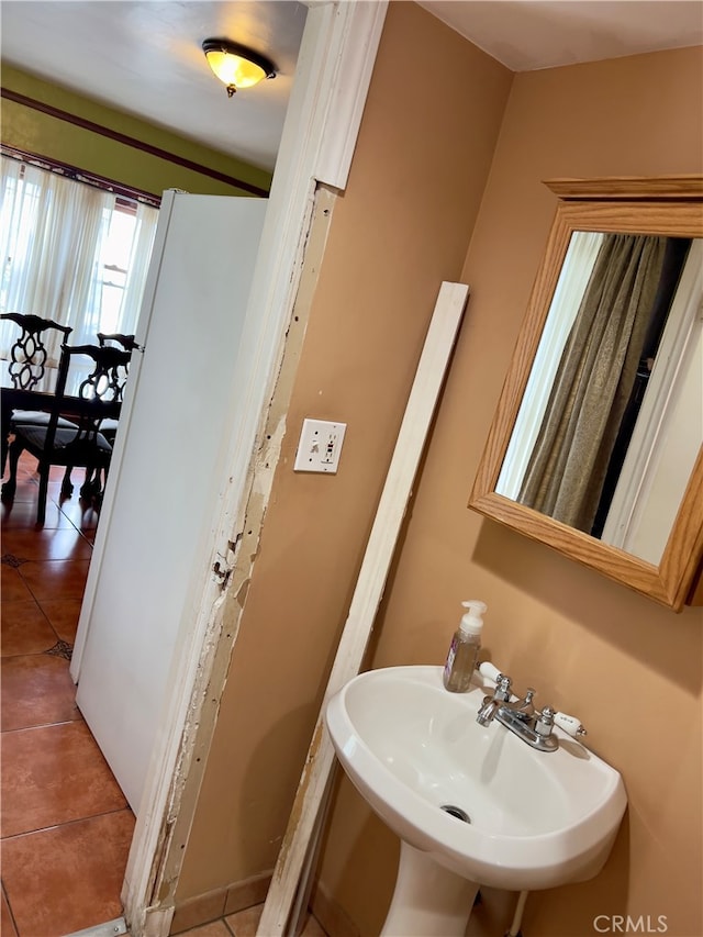 bathroom with tile patterned floors and sink