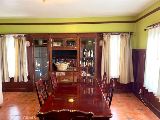 dining room with tile patterned floors