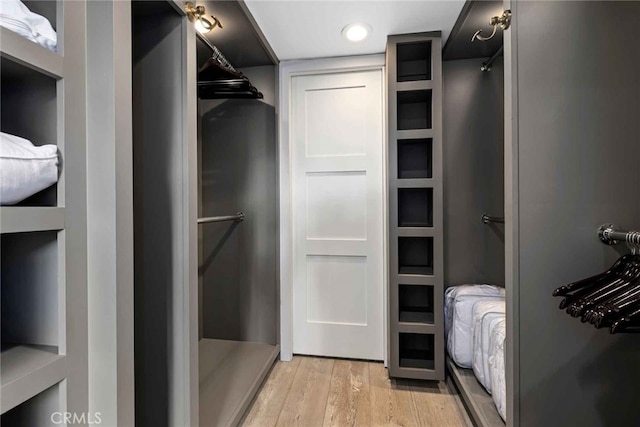 walk in closet featuring light wood-type flooring