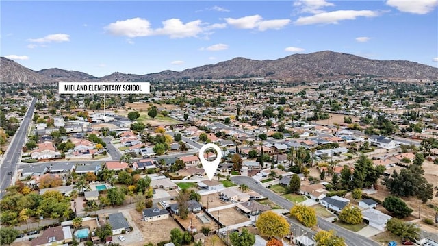 bird's eye view with a mountain view