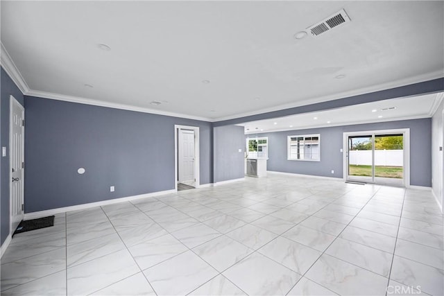 unfurnished room featuring crown molding