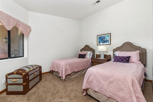 bedroom featuring carpet