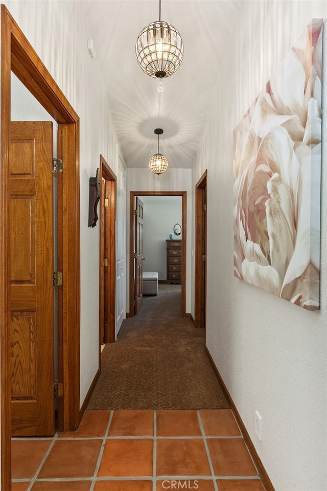 hall featuring tile patterned flooring