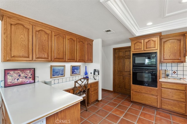 kitchen featuring tile patterned floors, black appliances, crown molding, a textured ceiling, and tasteful backsplash