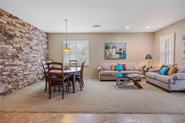 dining area with visible vents, carpet flooring, recessed lighting, and tile patterned flooring