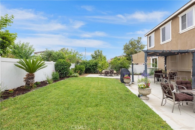 view of yard with a pergola and a patio