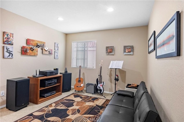 living room with baseboards and recessed lighting