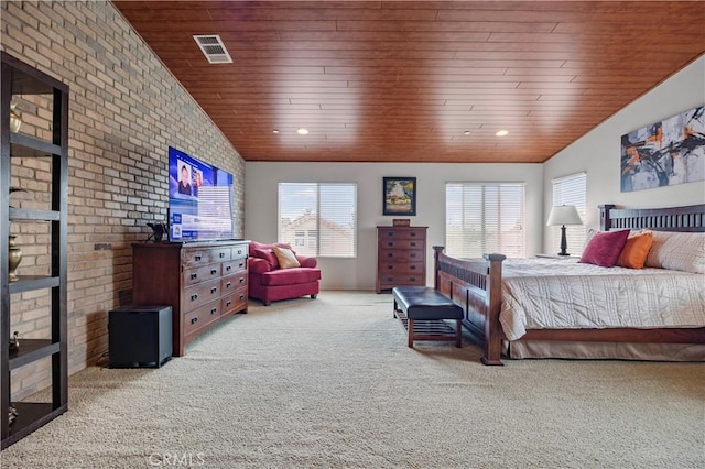 bedroom with wood ceiling, vaulted ceiling, visible vents, and carpet