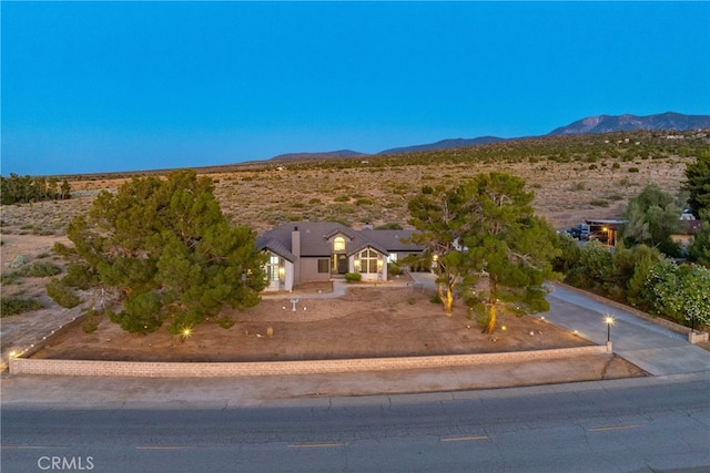 exterior space featuring a mountain view