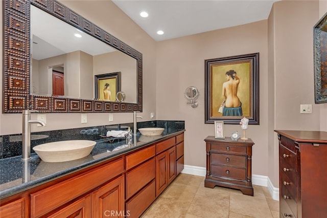 bathroom with vanity and tile patterned flooring