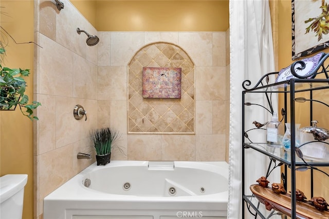 bathroom featuring shower / bath combination with curtain and toilet