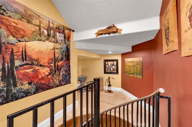 corridor featuring lofted ceiling