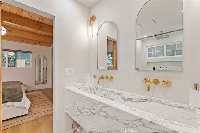 bathroom featuring wood-type flooring, beamed ceiling, and wood ceiling