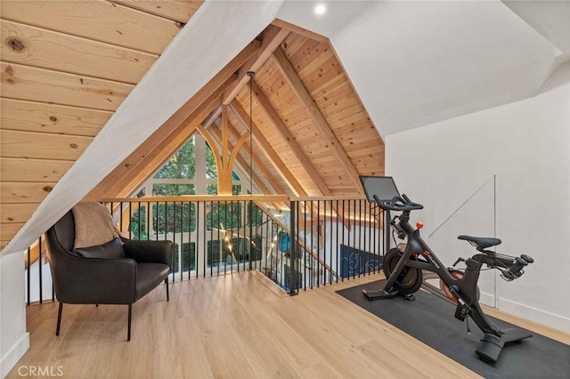 workout area with wooden ceiling, vaulted ceiling, and hardwood / wood-style flooring