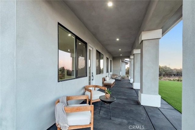 view of patio terrace at dusk