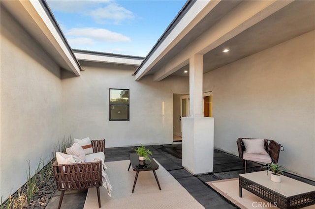 view of patio with an outdoor living space