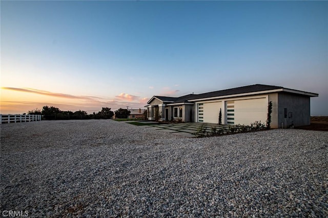 view of front of property with a garage