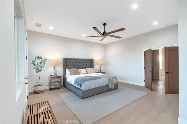 bedroom featuring ceiling fan and light wood-type flooring