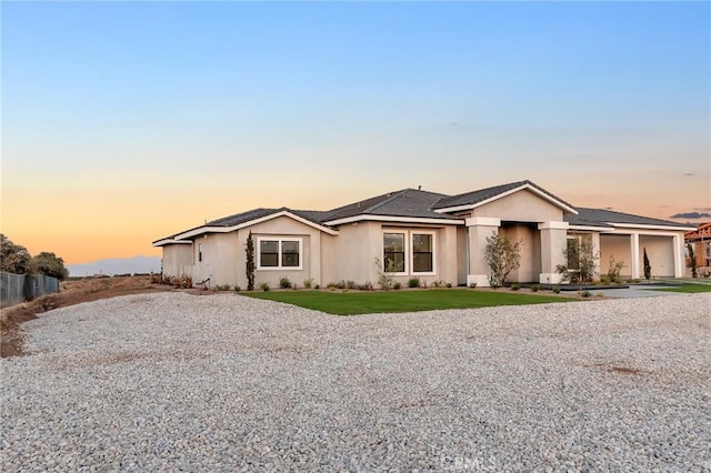 ranch-style home with a garage