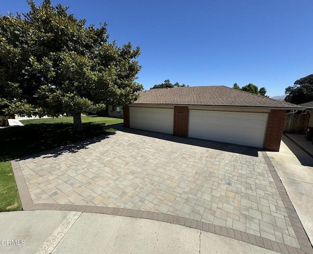 view of front of home with an outbuilding and a garage