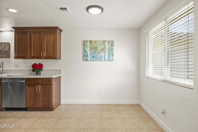 kitchen featuring stainless steel dishwasher