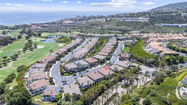 birds eye view of property featuring a water view, view of golf course, and a residential view