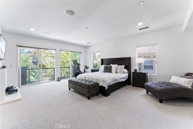 bedroom featuring access to outside, visible vents, light carpet, and recessed lighting