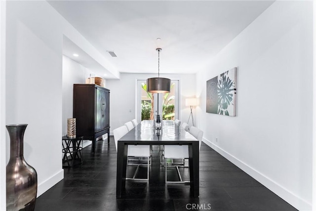 dining space with baseboards, visible vents, dark wood-type flooring, french doors, and recessed lighting