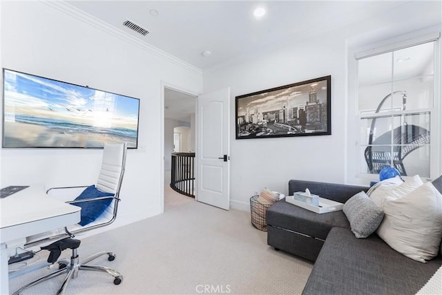 carpeted home office with visible vents, crown molding, and baseboards