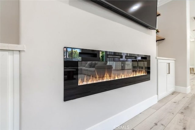 4806 W Concord Ave, Visalia, CA 93277 - detailed view of wood finished floors and baseboards
