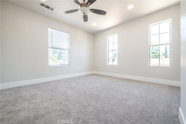 4806 W Concord Ave, Visalia, CA 93277 - empty room with healthy amount of natural light, baseboards, a ceiling fan, carpet, and recessed lighting