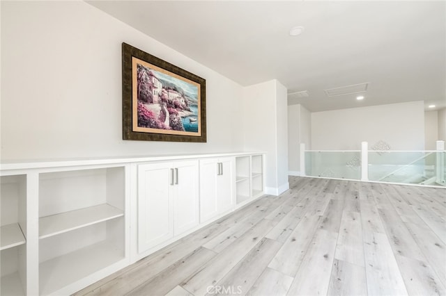 unfurnished room featuring light hardwood / wood-style floors