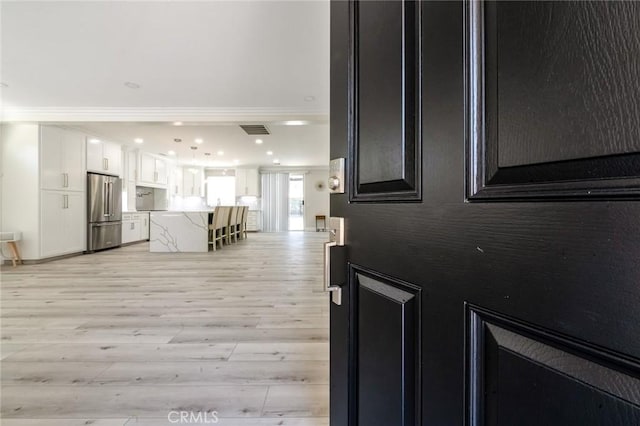 4806 W Concord Ave, Visalia, CA 93277 - entrance foyer with light wood-style floors, crown molding, and recessed lighting