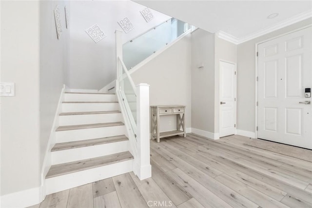 4806 W Concord Ave, Visalia, CA 93277 - foyer entrance featuring stairs, ornamental molding, wood finished floors, and baseboards