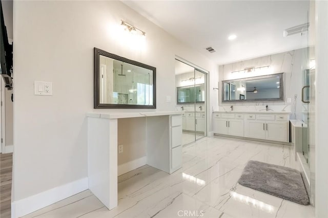 4806 W Concord Ave, Visalia, CA 93277 - bathroom featuring baseboards, vanity, a shower stall, marble finish floors, and recessed lighting