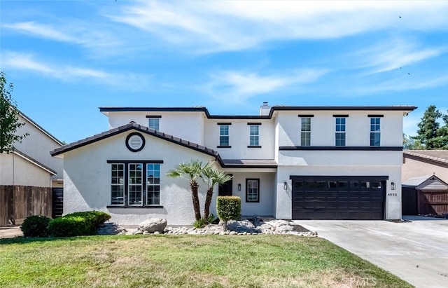 4806 W Concord Ave, Visalia, CA 93277 - view of front facade featuring stucco siding, driveway, and a garage